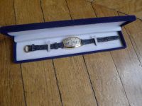 Cartier - Cartier Tonneau (femme) double fuseaux horaire