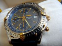 Rolex - Trs belle montre Breitling Chronomat modle 18K /