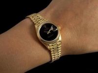 Rolex - Rolex dame Datejust 18K ors jaunes onyx